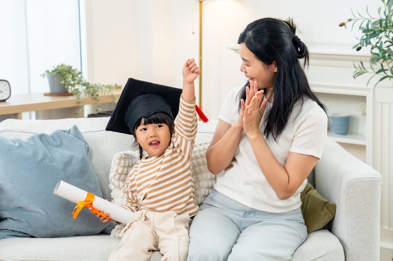 Happy family celebrating child graduation education future
